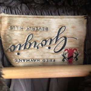 Freddie Hayman’s Giorgio Faux coat